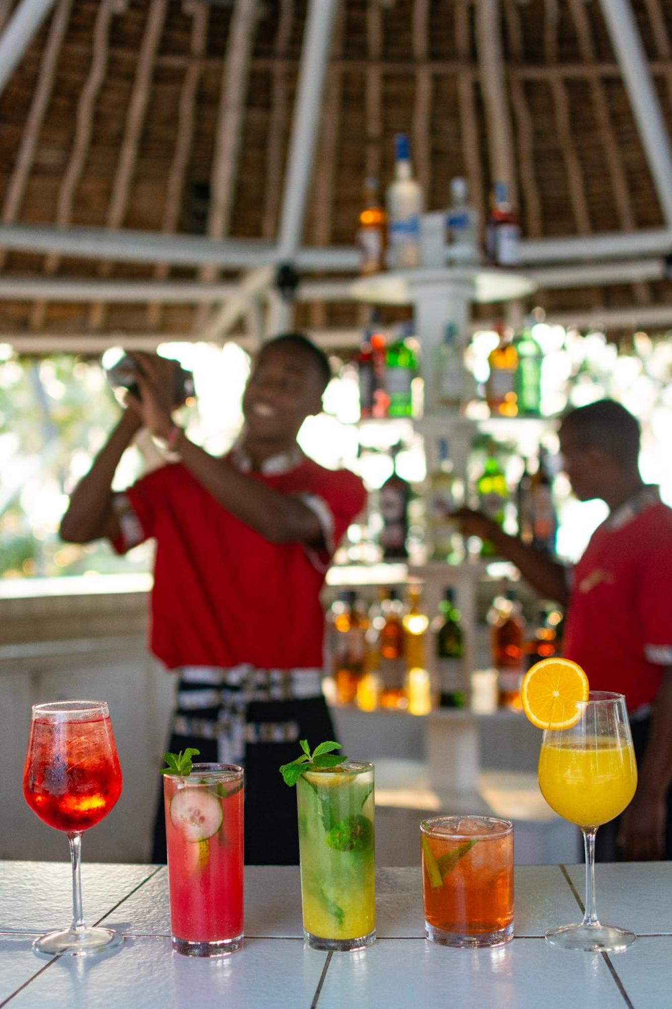 Diamonds Leisure Beach & Golf Resort Diani Beach Ngoại thất bức ảnh Bartenders at work