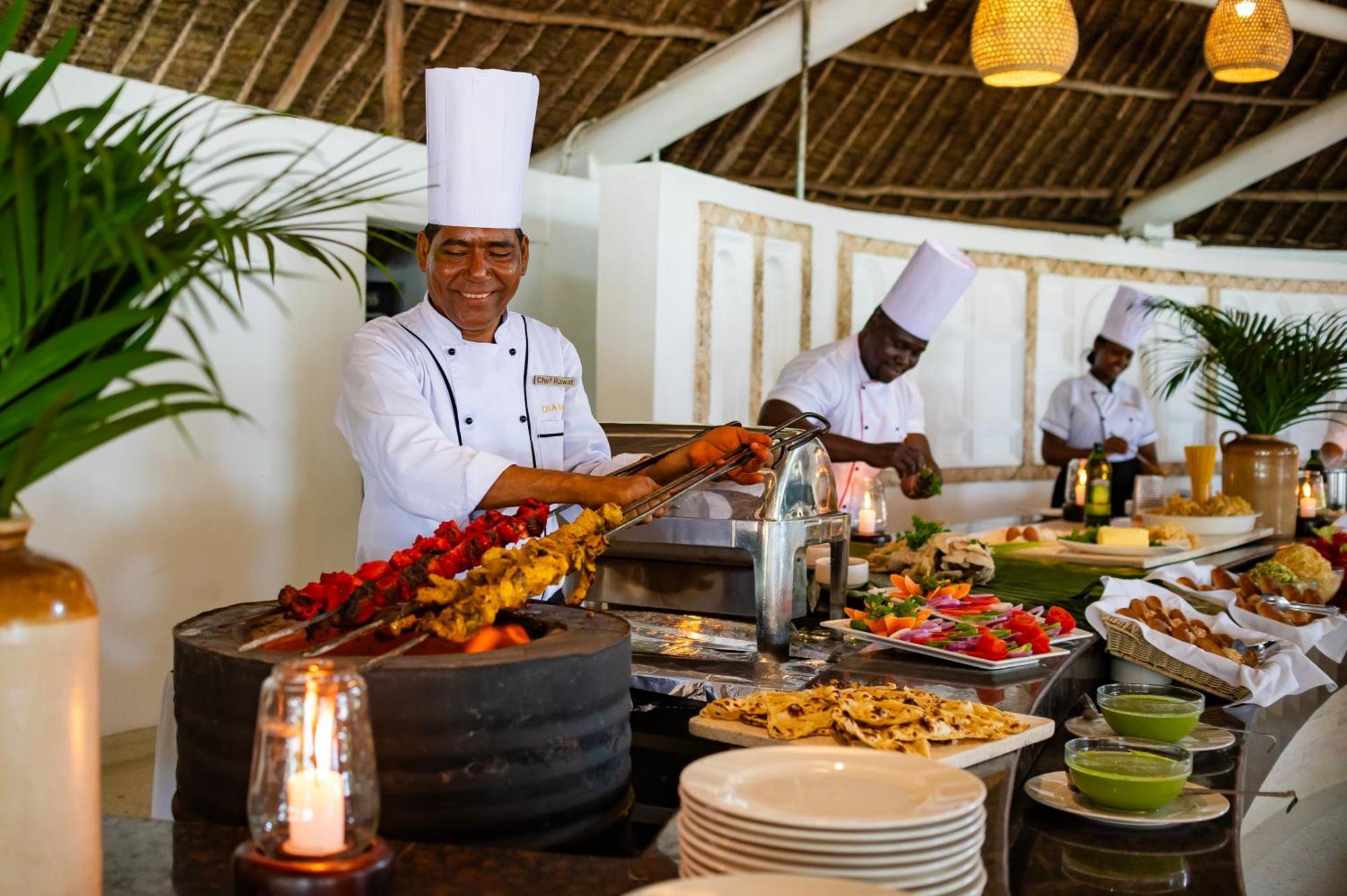 Diamonds Leisure Beach & Golf Resort Diani Beach Ngoại thất bức ảnh A buffet at a resort